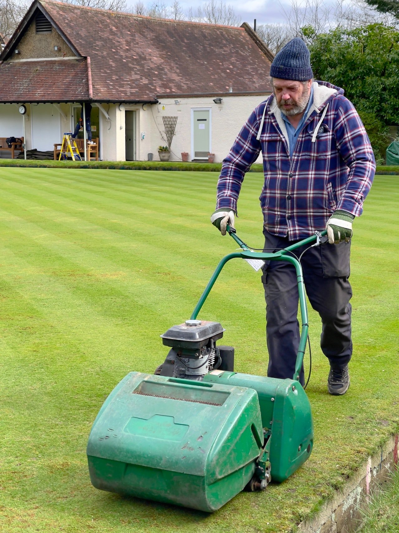 Cylinder & Rotary Lawn Mowers Inside The Yard