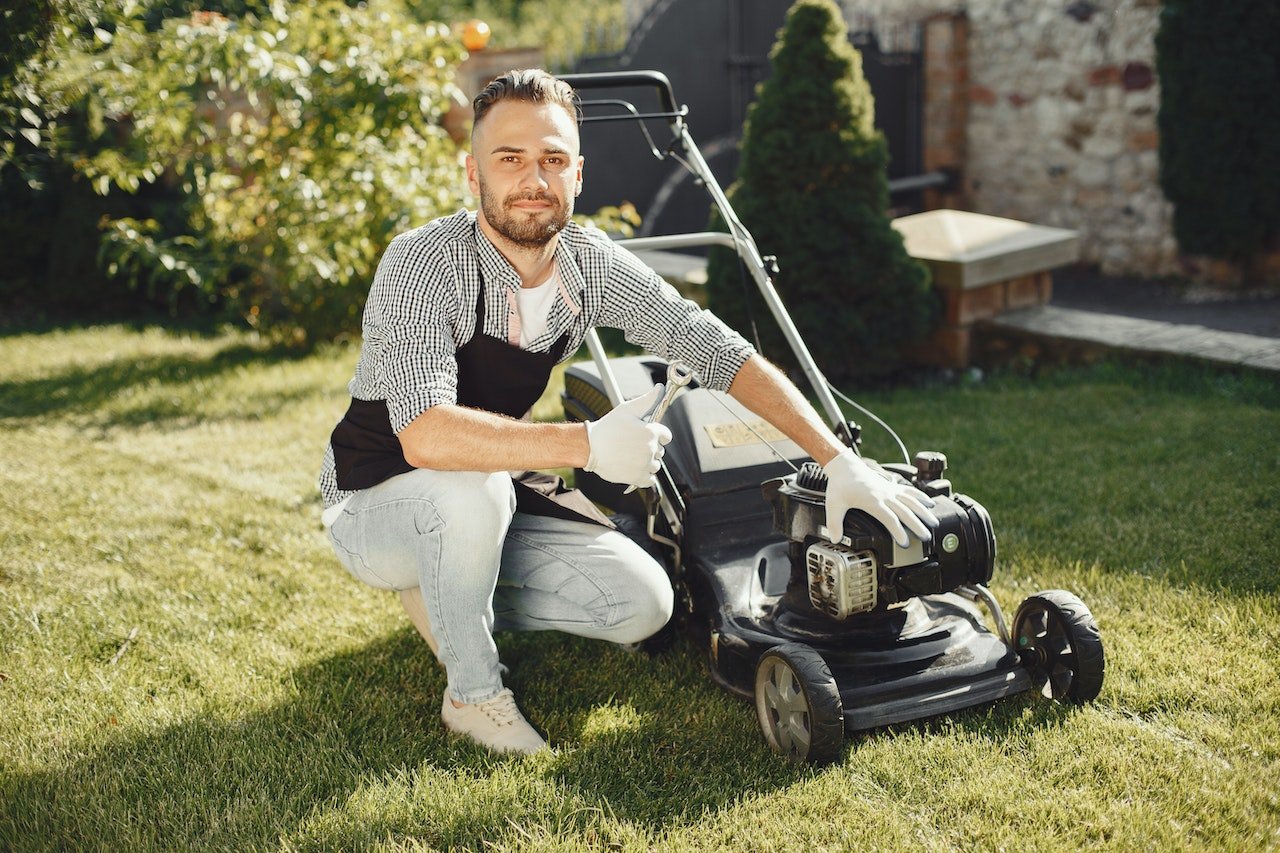 mowerf person sitting in front of mower
